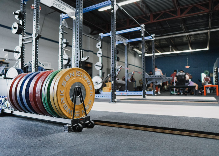 Kilo Strength weightlifting platforms and bumper plates