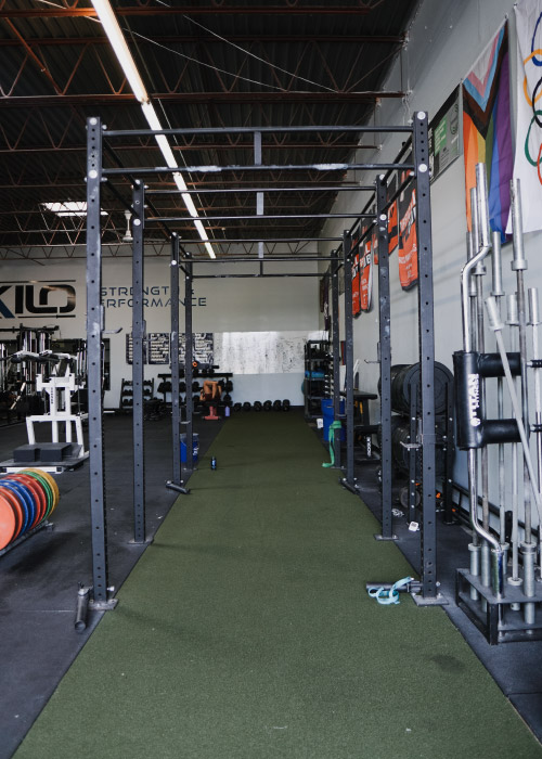 Kilo Strength power racks and turf